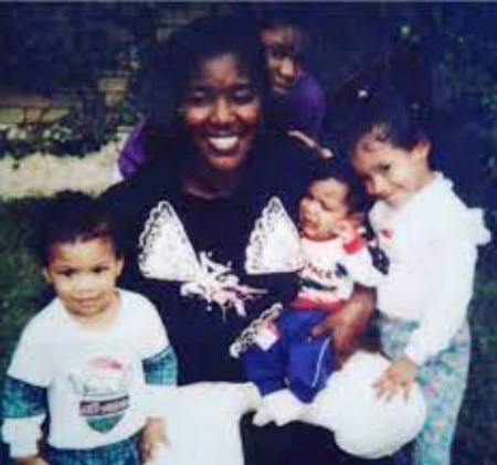 Rome Flynn with his mother  Nickey Alexander and siblings during his early life.
